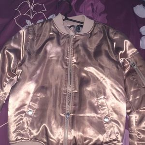 Bomber jacket color rose gold  from Forever 21 .